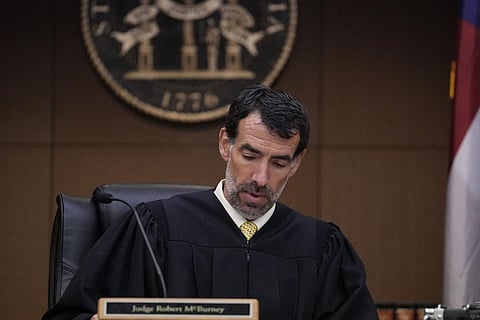 FILE - Fulton County Superior Court Judge Robert McBurney looks through paperwork, Monday, Aug. 14, 2023, in Atlanta. (Photo | AP)