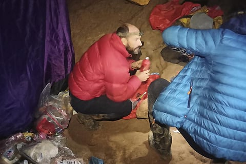 American caver Mark Dickey, left, 40, talks to a colleague inside the Morca cave near Anamur, southern Turkey, Thursday, Sept. 7, 2023. (Photo | AP)