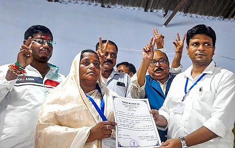 JMM candidate Baby Devi receives her certificate of election after winning the Dumri constituency by-election, in Giridih district, Friday, Sept. 8, 2023. (PTI Photo)