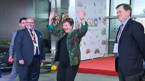 IMF's Managing Director Kristalina Georgieva shakes a leg as she receives a traditional welcome upon her arrival at the airport ahead of the G20 Summit, in New Delhi. (Photo | Screengrab)