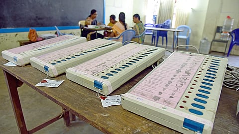 For representational purpose. Electronic Voting Machines inside a polling station.