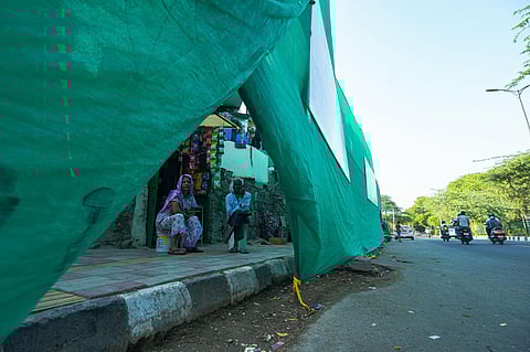 Delhi slums covered up with sheets amid G20