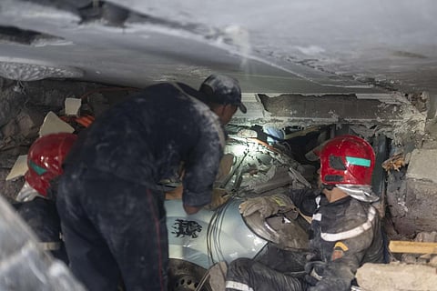 Security forces take part in a rescue operation after an earthquake, in Moulay Ibrahim village, near the epicentre of the earthquake, outside Marrakech. (Photo | AP)