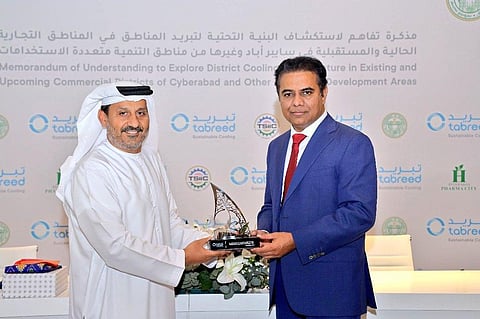 IT minister K.T. Rama Rao with Khalid Al Marzooqi, CEO of Tabreed, in Dubai on Wednesday. (Photo | ENS)