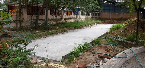 A concrete bar has been laid to position the coach for the restaurant on the railway museum premises in Tiruchy. (Photo | M K Ashok Kumar, EPS)