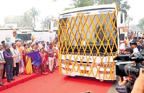 Pradhan flagging off a Skill on Wheel bus at Goshala. (Photo | Express)