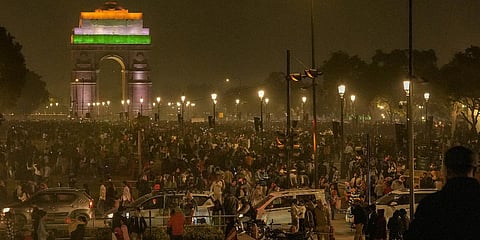 People visit the India Gate on the first day of the new year 2024, in New Delhi (Photo | PTI)