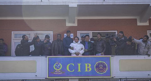 Controversial spiritual leader Ram Bahadur Bomjan appears in handcuffs during a press conference at the Central Investigation Bureau in Kathmandu. (Photo | AP)