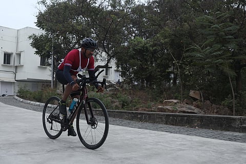Members of IPS from various states take part in the FitRise 75 NPA Triathlon cycling competition at Sardar Vallabhbhai Patel NPA in Hyderabad. (Express | Sri Loganathan Velmurugan)