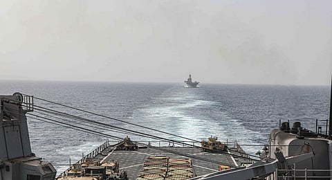 The amphibious dock landing ship USS Carter Hall and amphibious assault ship USS Bataan transit the Bab al-Mandeb strait. (Photo | AP)