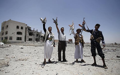 Houthi rebels hold up their weapons at the residence of a military commander of the Houthi militant group, in Sanaa, Yemen, Tuesday, April 28, 2015. (File Photo | AP)