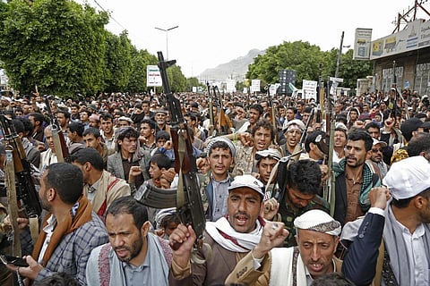 Houthi supporters chant slogans as they attend a rally in Sanaa, Yemen, on March 26, 2023. (Photo | AP)