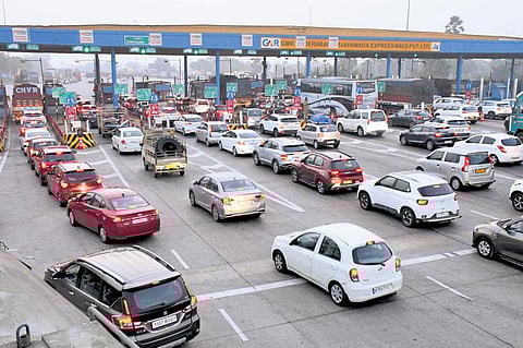 Vehicles line up at the Panthangi toll plaza on NH 65 in Yadadri Bhuvanagiri district