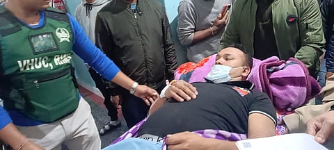 An injured security personnel taken to hospital. (Photo| Express).