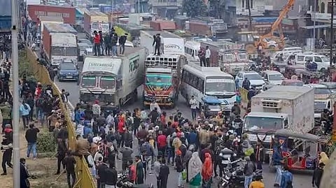 Truck drivers blocked the Agra-Delhi National Highway during a protest over the stringent provisions under proposed legislation on hit-and-run cases under Bharatiya Nyaya Sanhita 2023 in Mathura | PTI