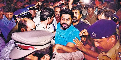 The Youth Congress workers who waved black flags at the Nava Kerala Sadas bus being taken to the magistrate’s house on Monday night.