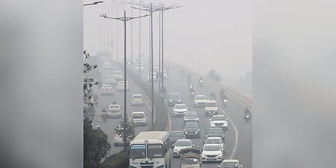 Vehicles move on a road amid low visibility due to dense fog, in New Delhi, Wednesday, Jan. 3, 2024 (Photo | PTI)