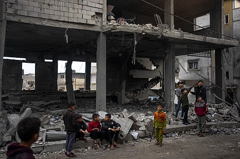 Palestinians look at the destruction after an Israeli strike in Rafah, southern Gaza Strip, Wednesday, Jan. 3, 2024. (Photo|AP)