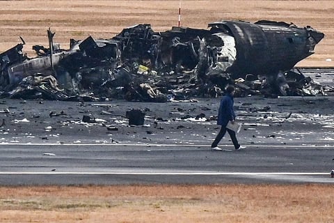 The wreckage of a Japan coast guard plane after collision. (Photo | AFP)