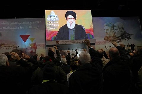 People watch the televised speech of Lebanon’s Hezbollah chief Hasan Nasrallah (Photo | AFP)