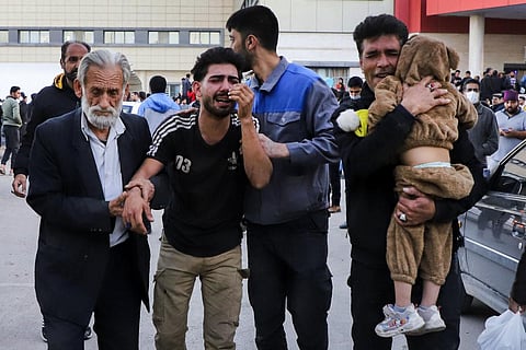 Families of victims of the explosions gather at the courtyard of a hospital in the city of Kerman, about 510 miles (820 kilometres) southeast of the capital Tehran, Iran. (Photo | AP)