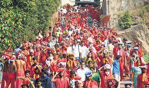Bhavani devotees performing Giripradakshina during the deeksha relinquishment at Durga temple | Prasant Madugula