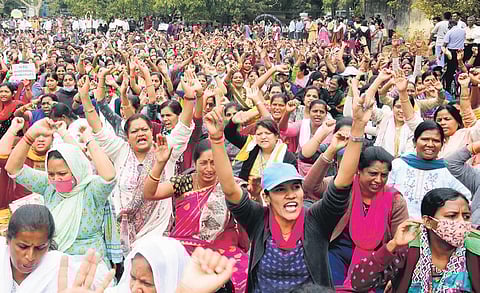 Guest lecturers of government first grade colleges from across the state protest at Freedom Park on Thursday | Express