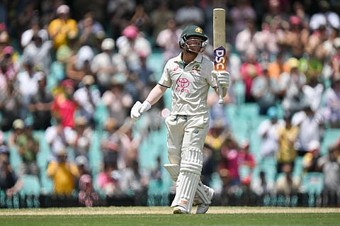 Australia's David Warner celebrates reaching his half century during day four of the third cricket Test match between Australia and Pakistan at the SCG in Sydney on January 6, 2024. (Photo | AFP)
