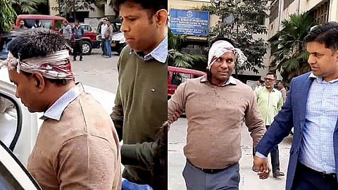 An injured member of the Enforcement Directorate (ED) team being taken after he was attacked during a raid in West Bengal.