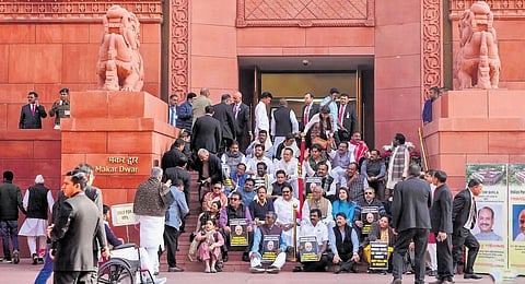 Suspended MPs at the Parliament House during the winter session | file photo