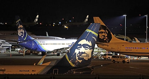 Alaska Airlines planes sit on the tarmac at Sea-Tac International Airport Friday evening. (Photo | AP)