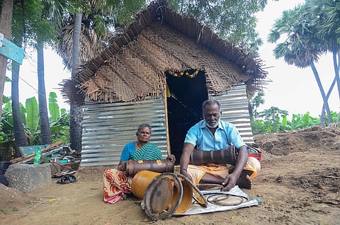 A Murugesan lost his percussion instruments, including the urumi, after the floodwater flattened his house and swept away his belongings following rain on December 17. | V Karthikalagu