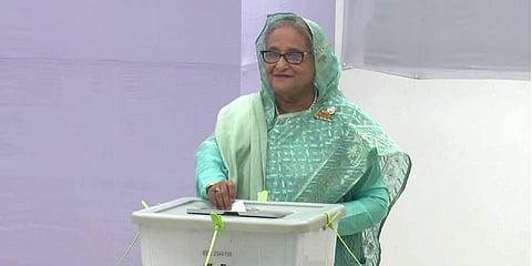 Bangladesh Prime Minister Sheikh Hasina casts her vote in the country's general elections, in Dhaka. (Photo | PTI)