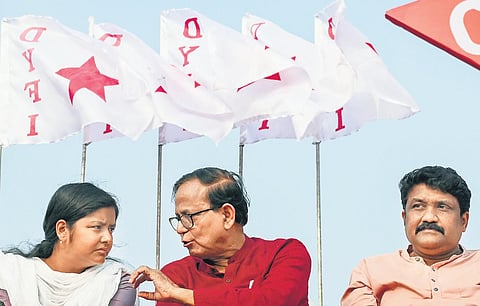 DYFI’s West Bengal secretary Minakshi Mukherjee with CPM secretary Md Salim and DYFI chief AA Rahim at the Brigade Parade Ground in Kolkata on Sunday | pti