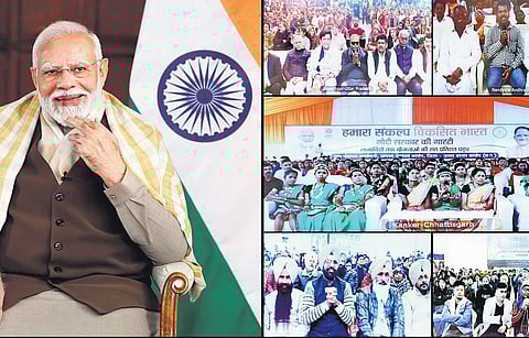 PM Narendra Modi interacts with beneficiaries of Viksit Bharat Sankalp Yatra | pti