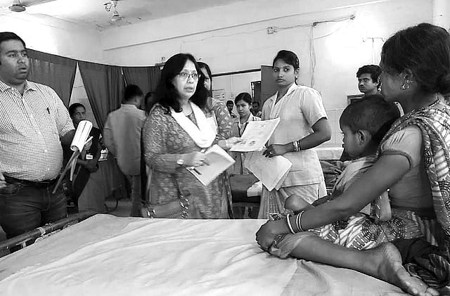 Central team member Dr Kalpana Barua interacting with kin of a JE affected child in DHH | EXPRESS