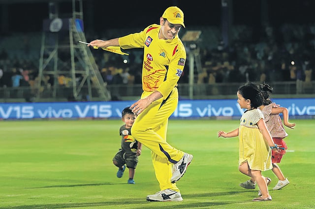 CSK skipper MS Dhoni playing with Ziva.