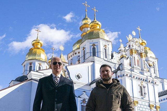 President Joe Biden walks with Ukrainian President Volodymyr Zelenskyy at St. Michael's Golden-Domed Cathedral on a surprise visit, Monday, Feb. 20, 2023, in Kyiv. (Photo | AP)