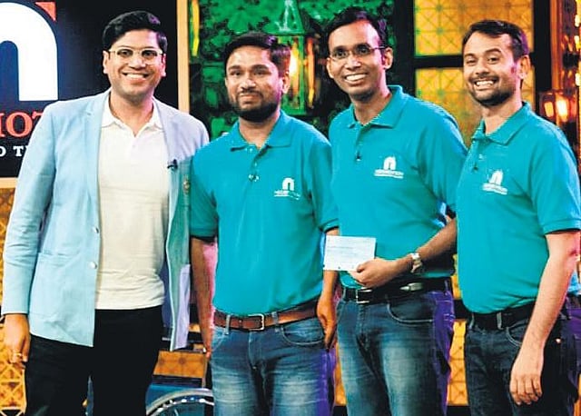 Swastik (second from right) with his NeoMotion co-founders at the Shark Tank show.