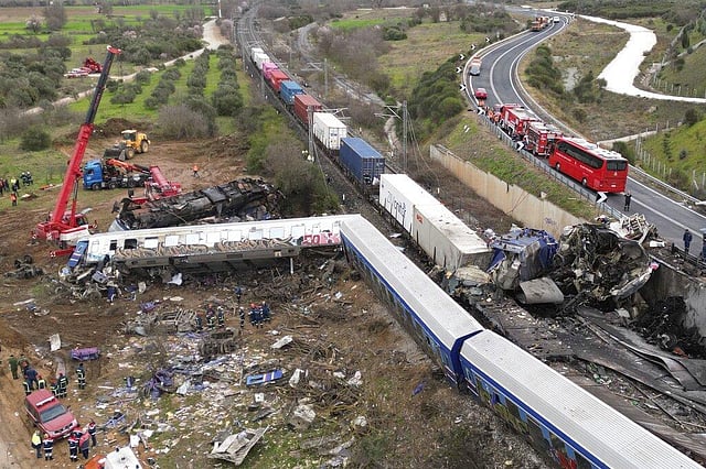 A crane, firefighters and rescuers operate after a collision in Tempe near Larissa city, Greece, Wednesday, March 1, 2023. (Photo | AP)