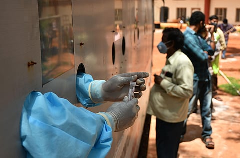 Public waiting to get themselves tested for coronavirus. (Photo | EPS/Prasant Madugula)