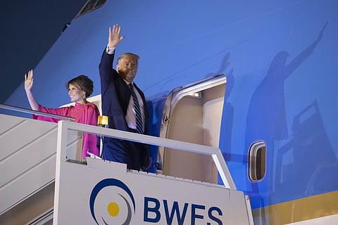 U.S.President Donald Trump, and first lady Melania Trump, wave as board Air Force One upon departure from at Indian Air Force Palam airport, Tuesday, Feb. 25, 2020. (Photo | AP)