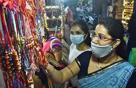 Girls seen buying rakhi threads in Chennai's Sowcarpet area ahead of Raksha Bandhan. (Photo | Ashwin Prasath, EPS)