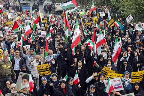 Iranians take part an anti-Israeli rally to show their solidarity with Palestinians in the capital Tehran on October 13, 2023. (Photo | AFP)