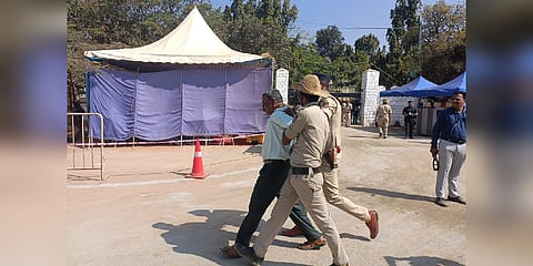 Police whisk Parashuram away from the ground on Friday