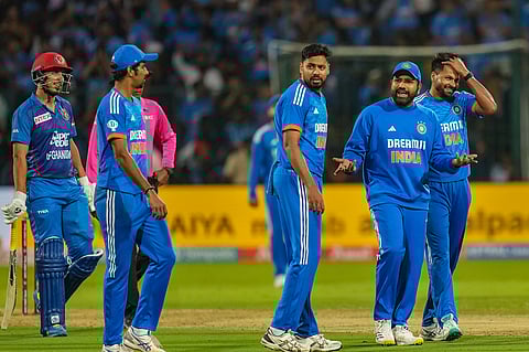 India's captain Rohit Sharma with others after the second innings during the third T20 cricket match between India and Afghanistan, at M Chinnaswamy Stadium, in Bengaluru