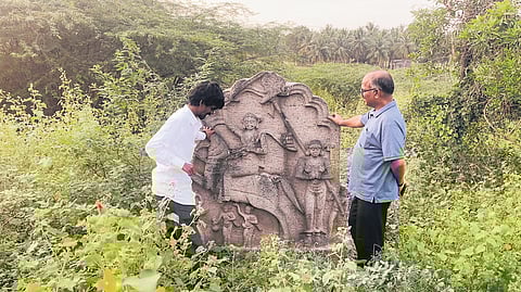 The stone depicts a warrior riding on a horse.