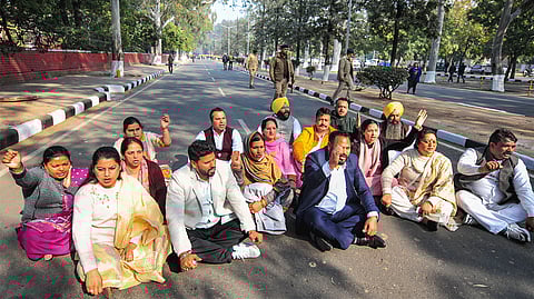 AAP and Congress councillors protest after the result was declared in the Chandigarh mayoral polls, in Chandigarh, Tuesday, Jan. 30, 2024.