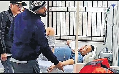 The injured crew member at the hospital