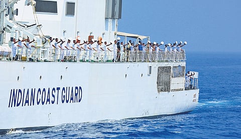 Indian Coast Guard (ICG) personnel saluting Governor Arif Mohammed Khan during the ‘steam past’ held as part of an operational demonstration on the occasion of the 48th Raising Day of the ICG on Wednesday